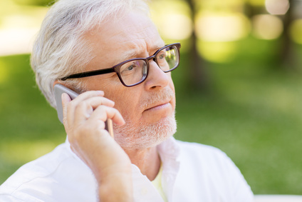 Man distressed on the phone. 