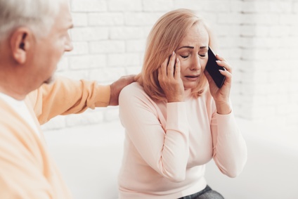 Husband comforting upset wife. 